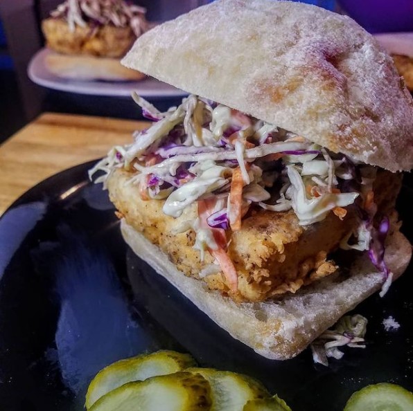 Crispy fried tofu sandwich with umami-rich marinade