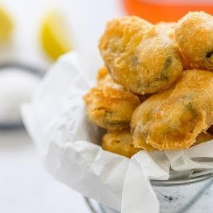 Sustainably farmed mussels are coated with a crunchy batter made from upcycled brewer's spent grain.