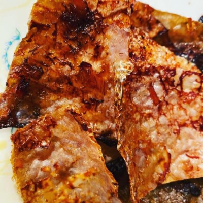 Fish skin baked in the oven with salt and sriracha seasoning