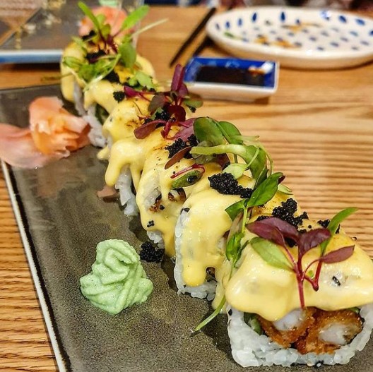 Sushi with spicy mayo, citrus ponzu, seared yuzu mayo and tobiko