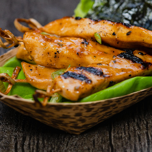 Orange and garlic glazed chicken skewers