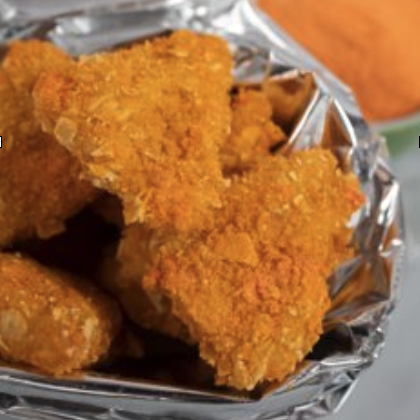 Griffith Foods’ Tortilla Chip Coating System and Nacho Cheese Seasoning amplify flavor and take fried chicken in a new direction.