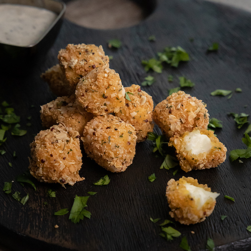 Fried halloumi bites made with Griffith Foods' superfood, ancient grain Creative Coating system.