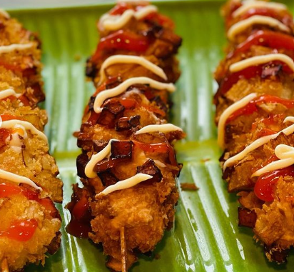 Three homemade corn dogs