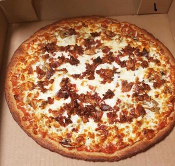 Pizza from Milano Pizzeria in Canada made with almond flour crust