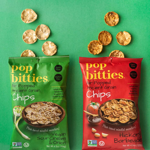 One bag of vegan sour cream and onion pop bitties chips open with chips coming out next to a Hickory Barbecue bag