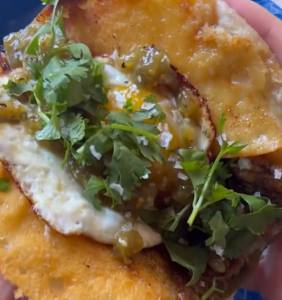 Breakfast taco cooked open-faced on a skillet