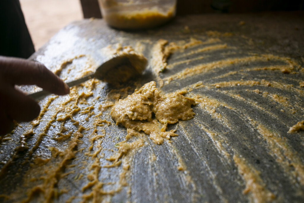 South American Flavors features preparing Peruvian yellow chili, also called aji amarillo sauce with a fulling mill in the city of Cusco in Peru.