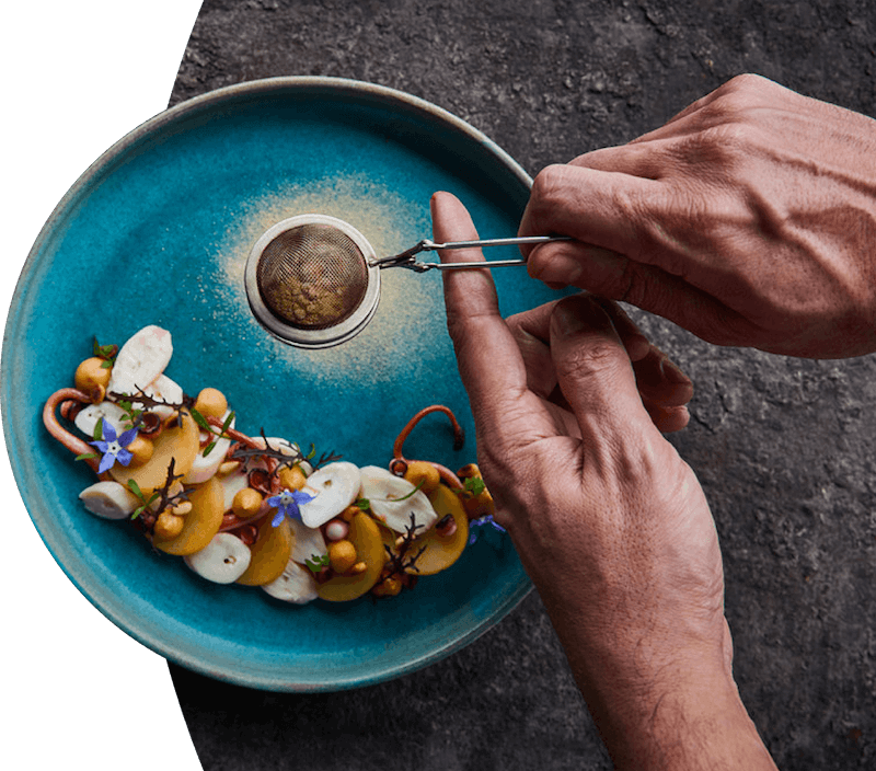 fresh food with herbs on blue ceramic plate